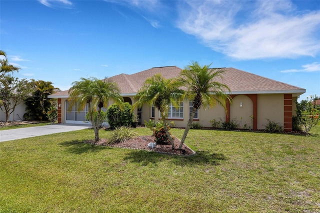 25509 Arequipa Dr, Punta Gorda, FL 33983 - view of front of property with stucco siding, a front lawn, and driveway