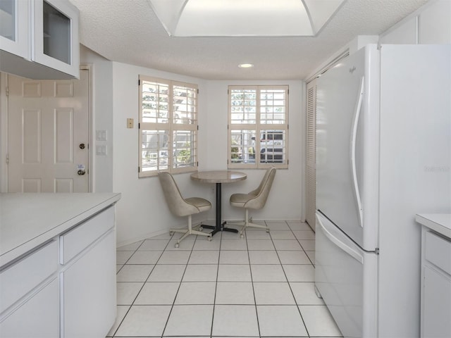 528 W Venice Ave Unit 1, Venice, FL 34285 - dining area featuring a textured ceiling, recessed lighting, and baseboards