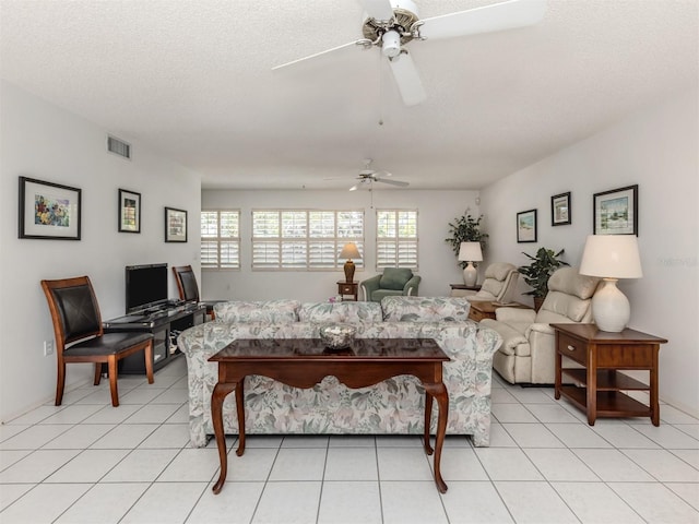 528 W Venice Ave Unit 1, Venice, FL 34285 - living area featuring a ceiling fan and light tile patterned floors