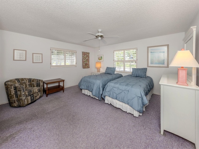 528 W Venice Ave Unit 1, Venice, FL 34285 - bedroom featuring carpet floors, a textured ceiling, and ceiling fan