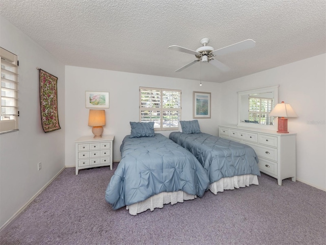 528 W Venice Ave Unit 1, Venice, FL 34285 - bedroom with carpet floors, a textured ceiling, and a ceiling fan