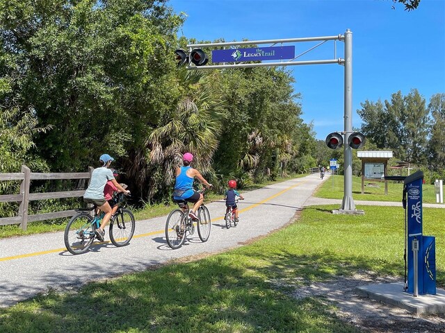528 W Venice Ave Unit 1, Venice, FL 34285 - view of property's community with fence and a yard