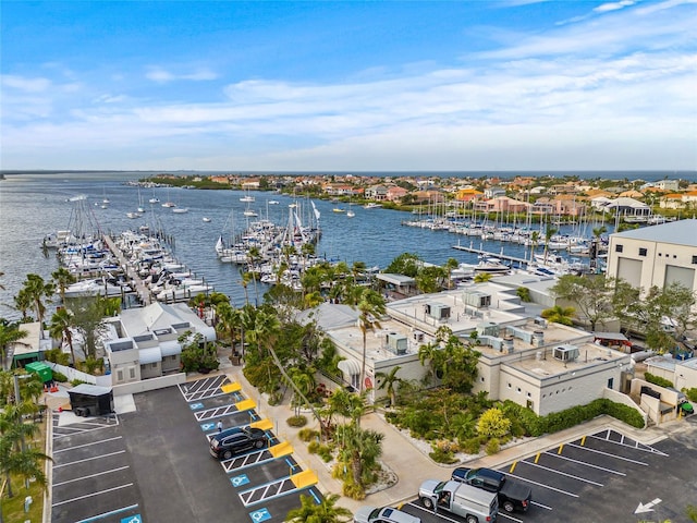 bird's eye view of a nearby body of water and numerous boat docks