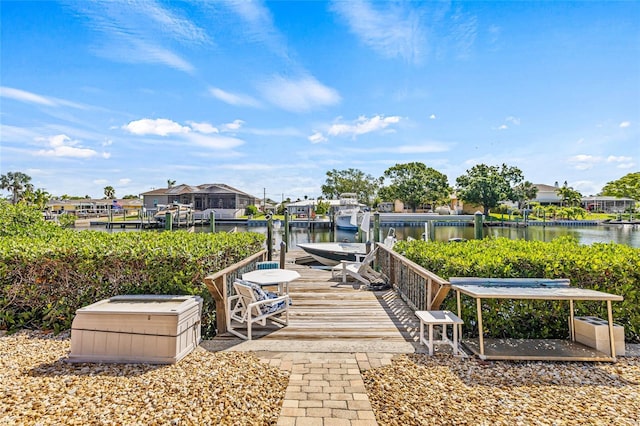 dock with a water view and boat lift