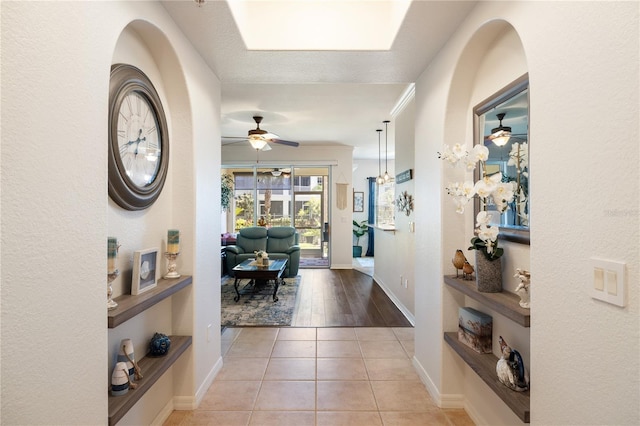 600 Gardens Edge Dr Unit 613, Venice, FL 34285 - foyer entrance with ceiling fan, baseboards, and tile patterned flooring