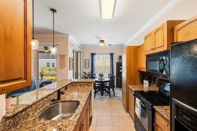 600 Gardens Edge Dr Unit 613, Venice, FL 34285 - kitchen featuring black appliances, a sink, ceiling fan, light stone countertops, and light tile patterned floors