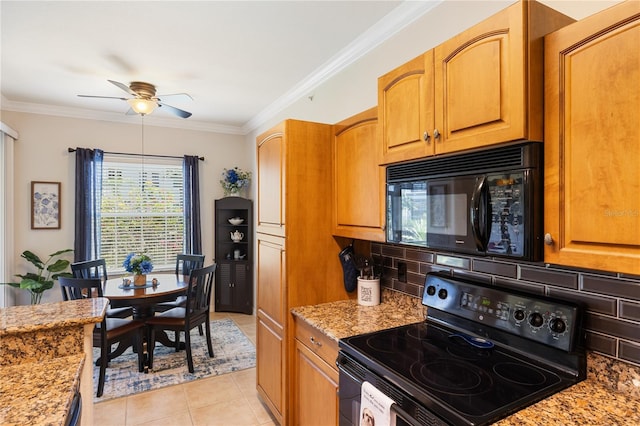 600 Gardens Edge Dr Unit 613, Venice, FL 34285 - kitchen with black appliances, ceiling fan, decorative backsplash, light tile patterned floors, and crown molding