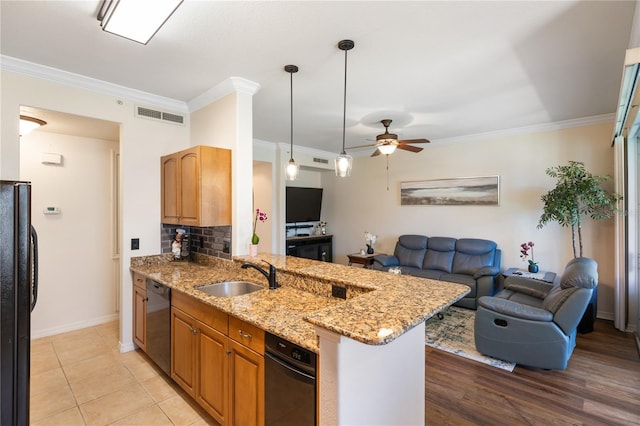 600 Gardens Edge Dr Unit 613, Venice, FL 34285 - kitchen featuring freestanding refrigerator, a sink, open floor plan, dishwashing machine, and ceiling fan