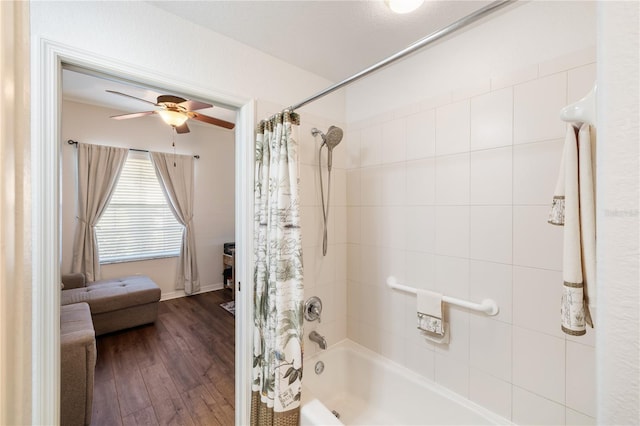600 Gardens Edge Dr Unit 613, Venice, FL 34285 - ensuite bathroom featuring shower / tub combo with curtain, a ceiling fan, and wood finished floors