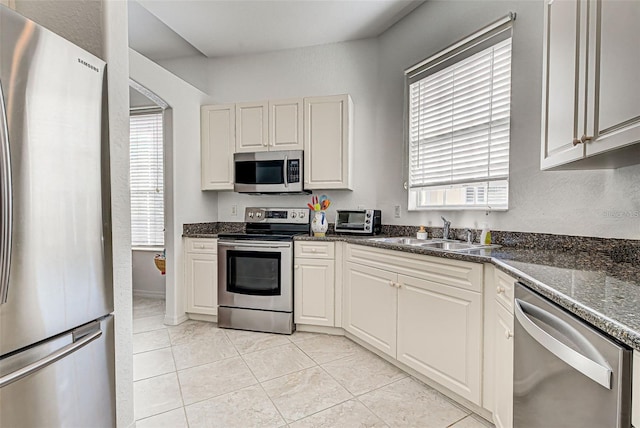 212 Triano Cir Unit 212, Venice, FL 34292 - kitchen with stainless steel appliances and a sink