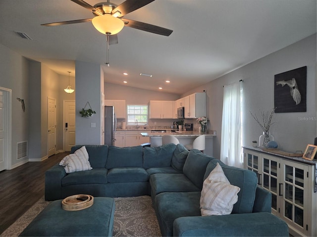 3003 58th Way E, Palmetto, FL 34221 - living room featuring lofted ceiling, dark wood-style floors, a ceiling fan, and recessed lighting
