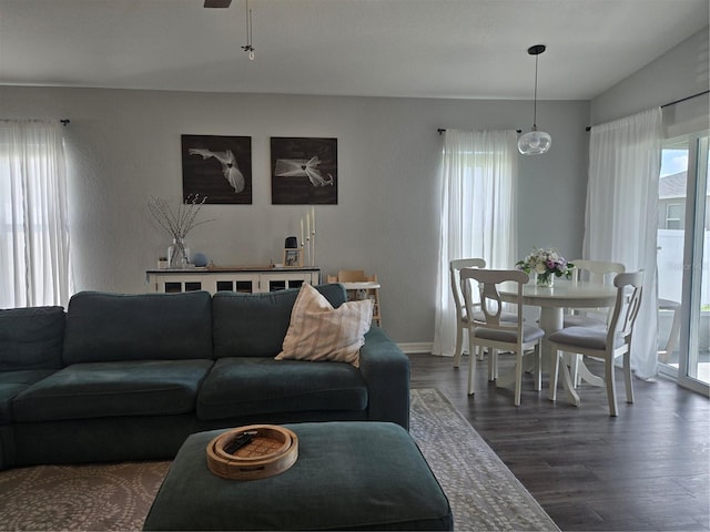 3003 58th Way E, Palmetto, FL 34221 - living room featuring dark wood finished floors, baseboards, and ceiling fan