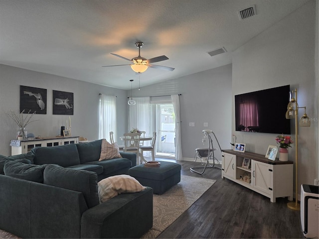 3003 58th Way E, Palmetto, FL 34221 - living room featuring a ceiling fan, dark wood-type flooring, baseboards, and lofted ceiling