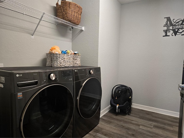 3003 58th Way E, Palmetto, FL 34221 - laundry area with separate washer and dryer, dark wood-style flooring, and baseboards