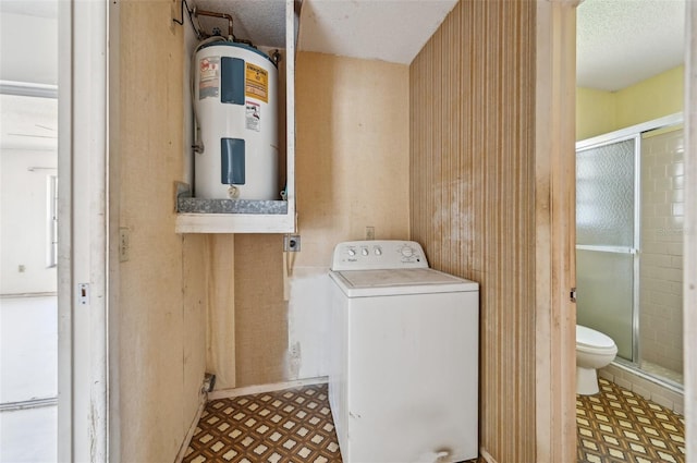 washroom featuring washer / clothes dryer, tile patterned floors, electric water heater, and a textured ceiling