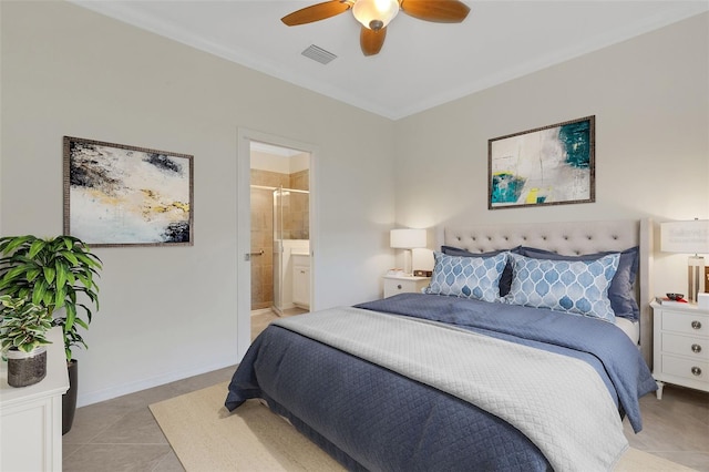 9823 Haze Dr, Venice, FL 34292 - bedroom with light tile patterned floors, ensuite bath, and a ceiling fan