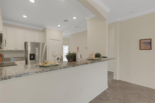 9823 Haze Dr, Venice, FL 34292 - kitchen featuring stainless steel fridge with ice dispenser, ornamental molding, light stone countertops, a peninsula, and white cabinetry
