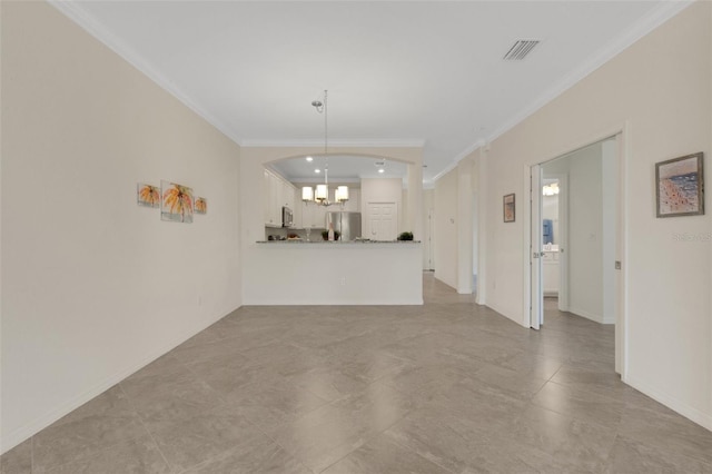 9823 Haze Dr, Venice, FL 34292 - unfurnished living room featuring crown molding, a chandelier, light tile patterned floors, and baseboards