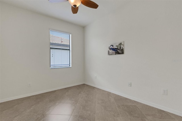 9823 Haze Dr, Venice, FL 34292 - empty room featuring ceiling fan, light tile patterned floors, and baseboards