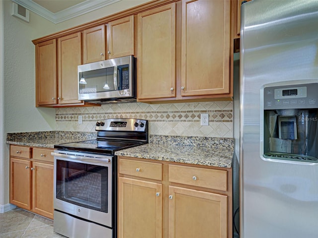 kitchen with stainless steel appliances, backsplash, ornamental molding, and light stone countertops