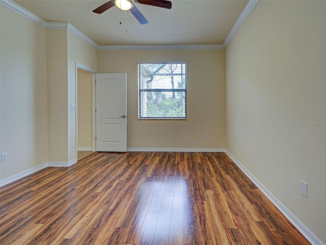 unfurnished room with ceiling fan, wood finished floors, ornamental molding, and baseboards