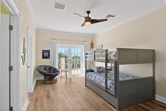 63 Palm Dr, Placida, FL 33946 - bedroom featuring ornamental molding, access to outside, wood finished floors, baseboards, and ceiling fan