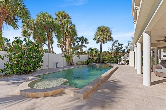 63 Palm Dr, Placida, FL 33946 - view of swimming pool featuring a fenced backyard, an in-ground hot tub, a patio area, a ceiling fan, and stairway