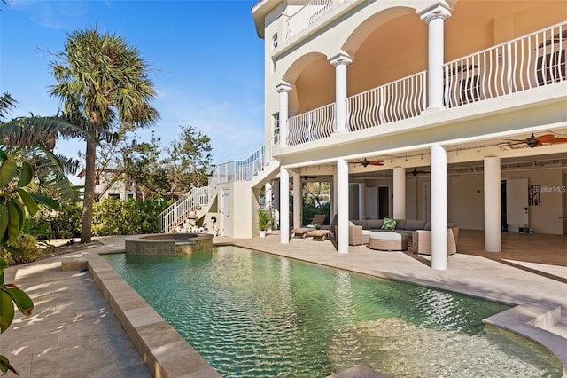 63 Palm Dr, Placida, FL 33946 - view of swimming pool with stairs, a ceiling fan, an outdoor living space, a pool with connected hot tub, and a patio