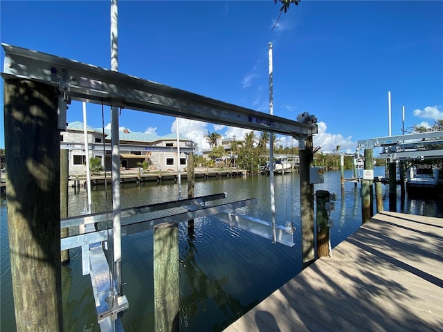 63 Palm Dr, Placida, FL 33946 - dock with boat lift and a water view