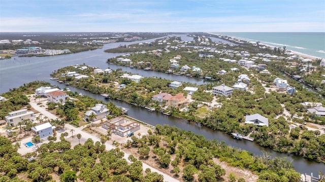 63 Palm Dr, Placida, FL 33946 - aerial perspective of suburban area featuring a large body of water