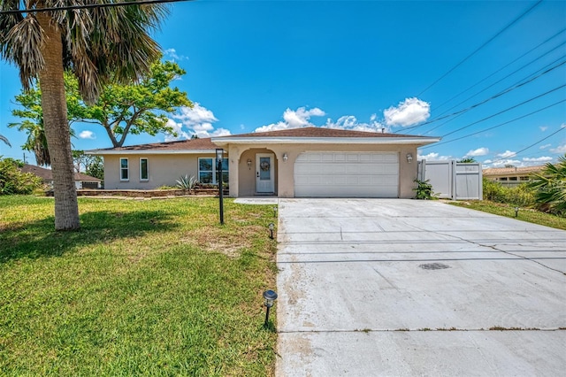 4321 Shamrock Dr, Venice, FL 34293 - ranch-style home featuring stucco siding, driveway, and a garage