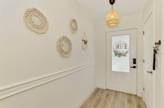 4321 Shamrock Dr, Venice, FL 34293 - foyer entrance featuring light wood-style flooring and baseboards