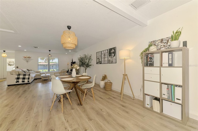 4321 Shamrock Dr, Venice, FL 34293 - dining space featuring light wood finished floors, baseboards, recessed lighting, and beam ceiling