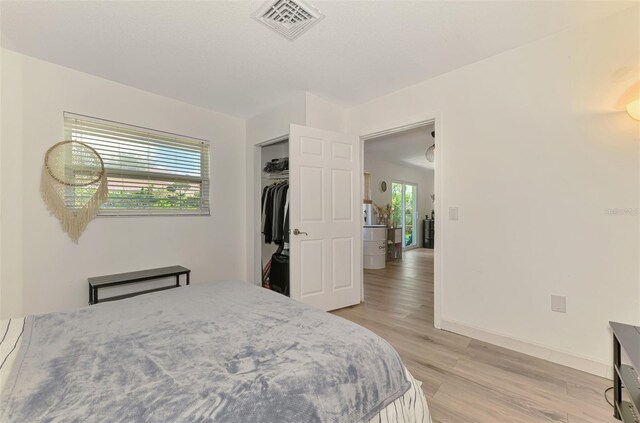 4321 Shamrock Dr, Venice, FL 34293 - bedroom featuring light wood-style floors, baseboards, and a closet