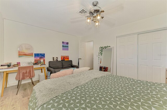 4321 Shamrock Dr, Venice, FL 34293 - bedroom with wood finished floors, a closet, an office area, and a ceiling fan