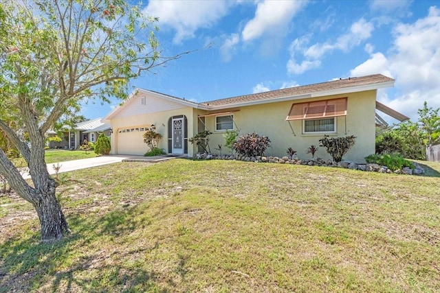 2618 Titania Rd, Englewood, FL 34224 - single story home featuring stucco siding, an attached garage, driveway, and a front lawn