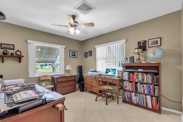 2618 Titania Rd, Englewood, FL 34224 - office area with a ceiling fan and light tile patterned floors