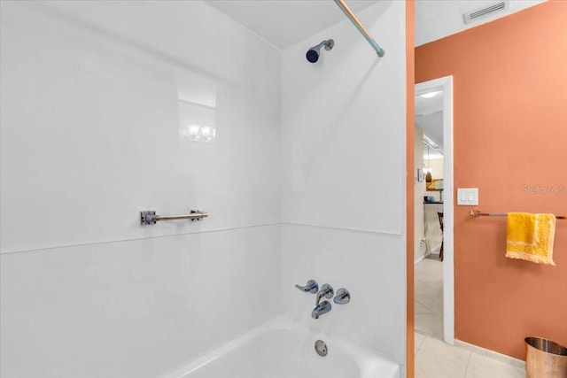 2618 Titania Rd, Englewood, FL 34224 - bathroom featuring shower / tub combination and tile patterned flooring