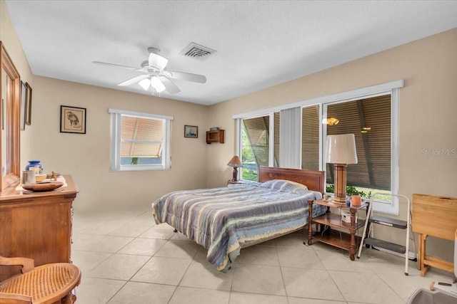2618 Titania Rd, Englewood, FL 34224 - bedroom featuring light tile patterned flooring and a ceiling fan