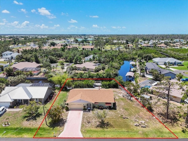 2618 Titania Rd, Englewood, FL 34224 - aerial view of residential area featuring property boundaries highlighted and a nearby body of water