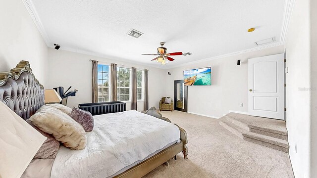 632 Tanana Fall Dr, Ruskin, FL 33570 - bedroom with crown molding, light colored carpet, baseboards, and a ceiling fan
