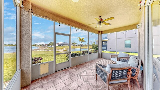632 Tanana Fall Dr, Ruskin, FL 33570 - sunroom / solarium with a water view and ceiling fan