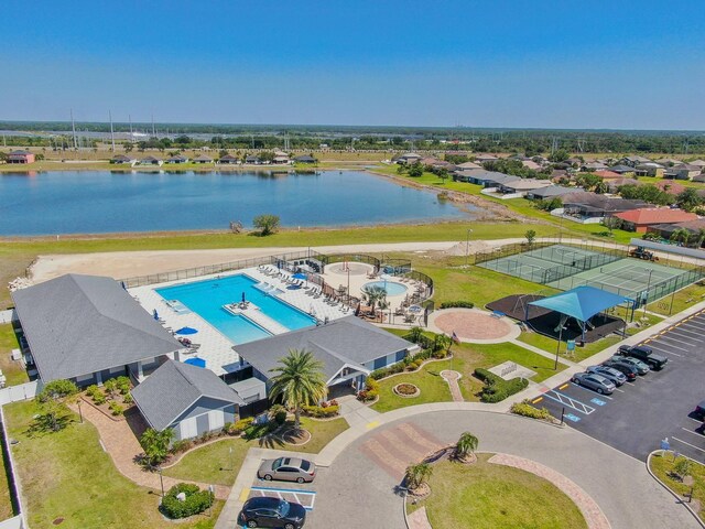 632 Tanana Fall Dr, Ruskin, FL 33570 - bird's eye view of a pool and a nearby body of water