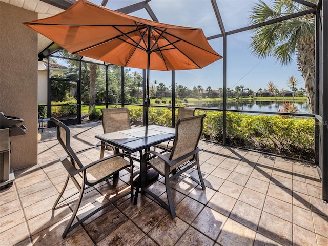 165 Tiziano Way N, Venice, FL 34275 - view of patio with glass enclosure, a water view, and outdoor dining area
