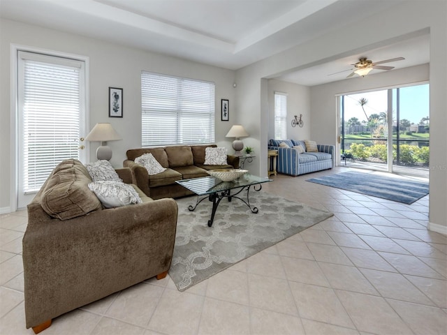 165 Tiziano Way N, Venice, FL 34275 - living room with tile patterned floors, ceiling fan, and baseboards