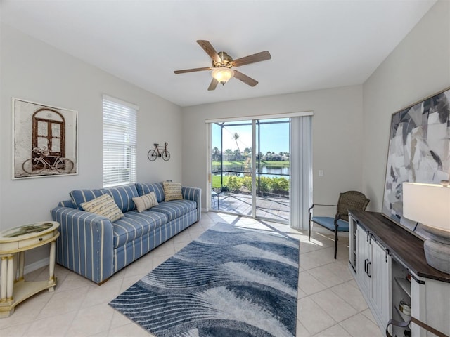 165 Tiziano Way N, Venice, FL 34275 - living room featuring light tile patterned floors, plenty of natural light, a water view, and ceiling fan