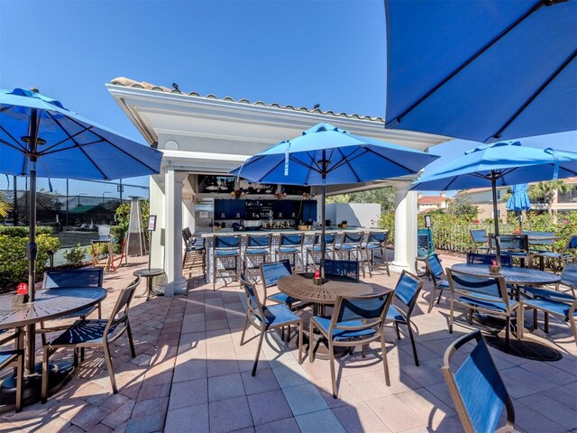 165 Tiziano Way N, Venice, FL 34275 - view of patio / terrace featuring a bar