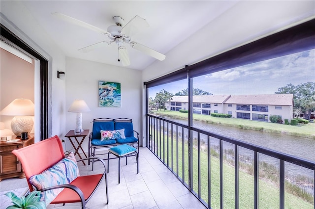 410 Mission Trl E Unit B, Venice, FL 34285 - sunroom featuring a water view and a residential view