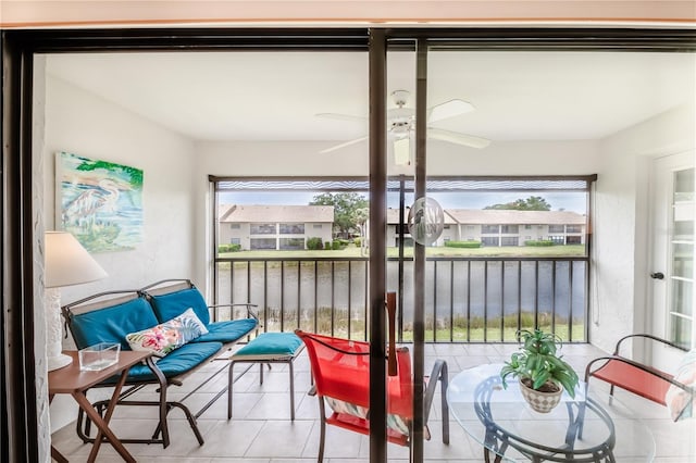 410 Mission Trl E Unit B, Venice, FL 34285 - sunroom with a water view and healthy amount of natural light