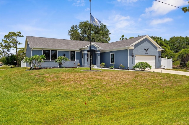 4305 Heyward St, North Port, FL 34291 - single story home featuring driveway, a garage, stucco siding, and a front lawn